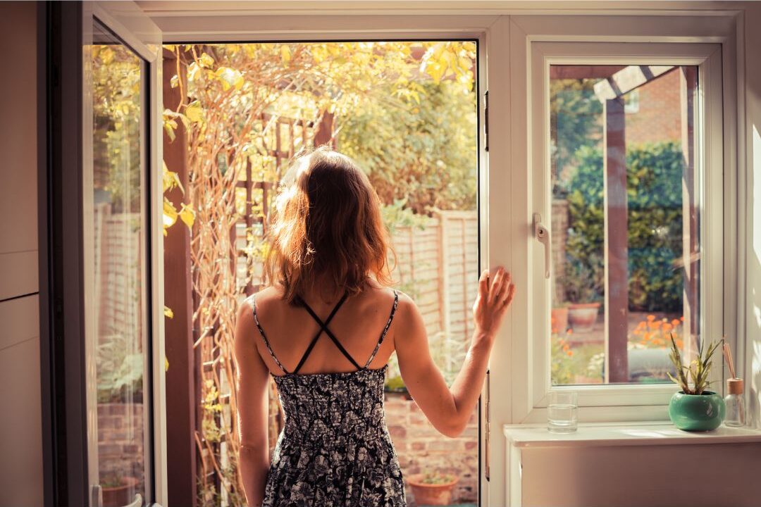 stay at home mom standing confidently affirming that her choice to stay home is valid