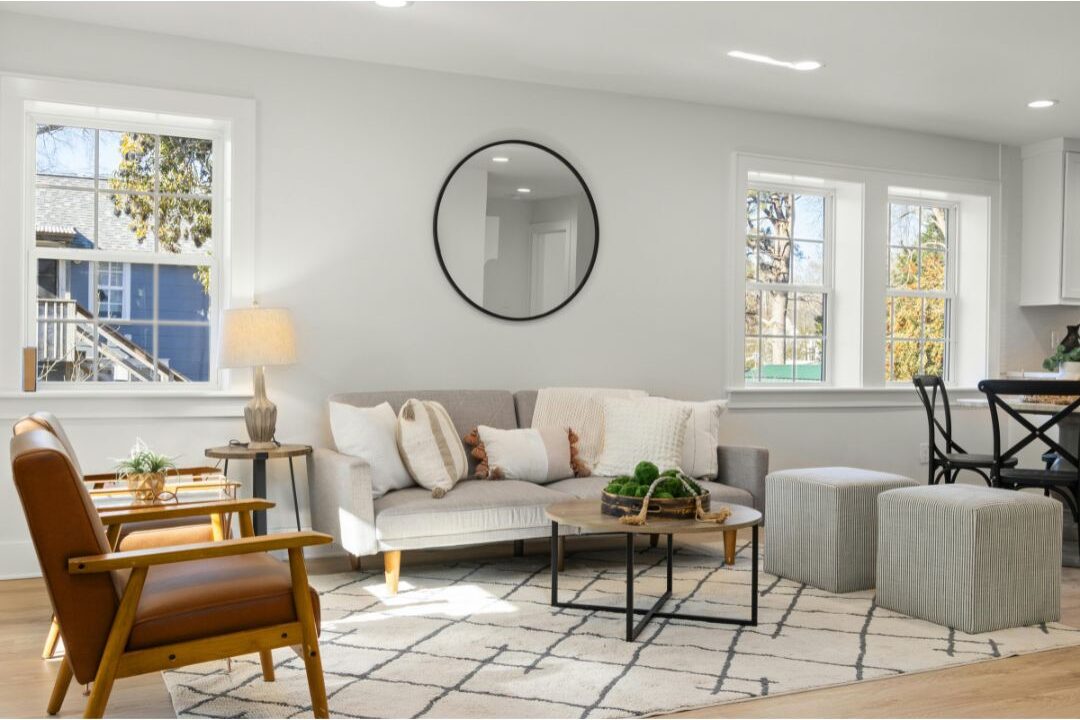 a clean organized living room highlighting the soft life lie social media tells moms