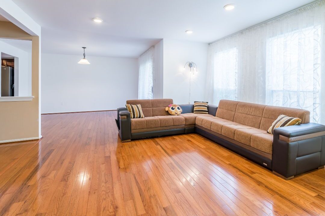 clean gleaming hardwood floors underfoot in a cozy living room