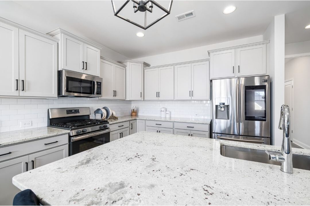 clear kitchen counter island ready for entertaining visitors
