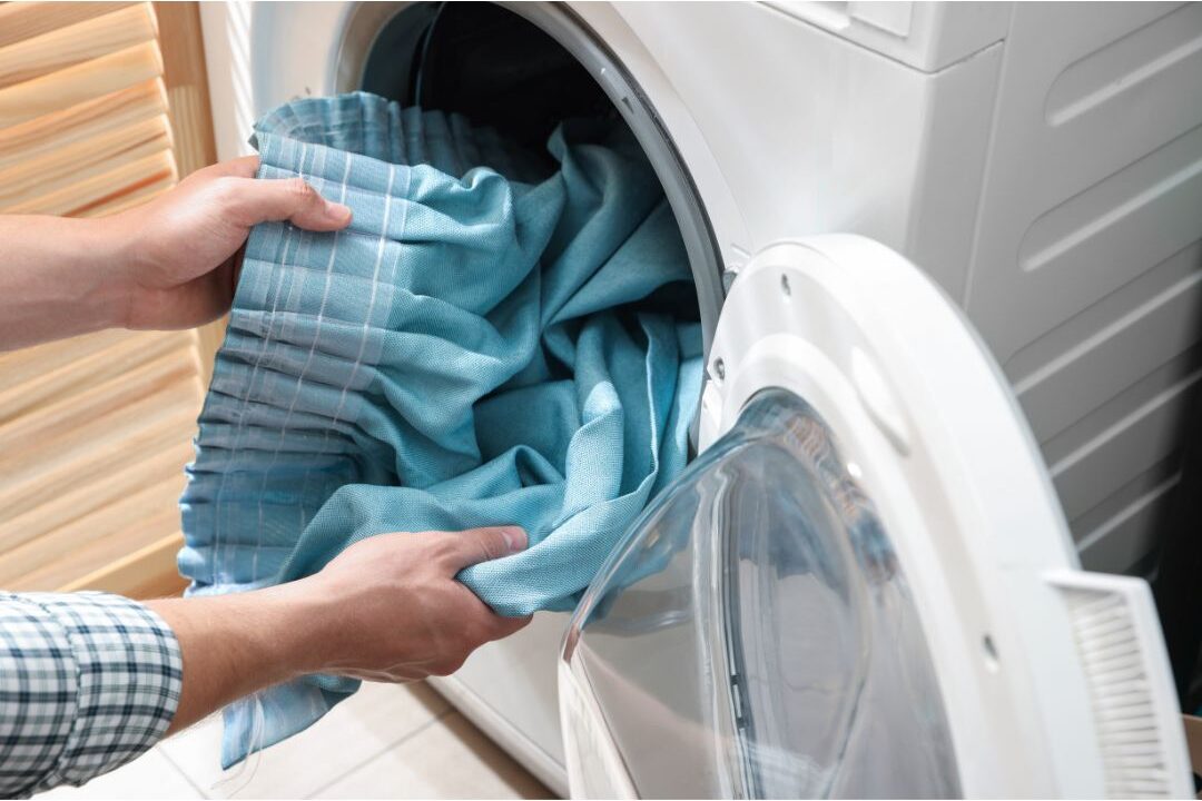 washing curtains to fix one of the hidden reasons why a home always smells bad
