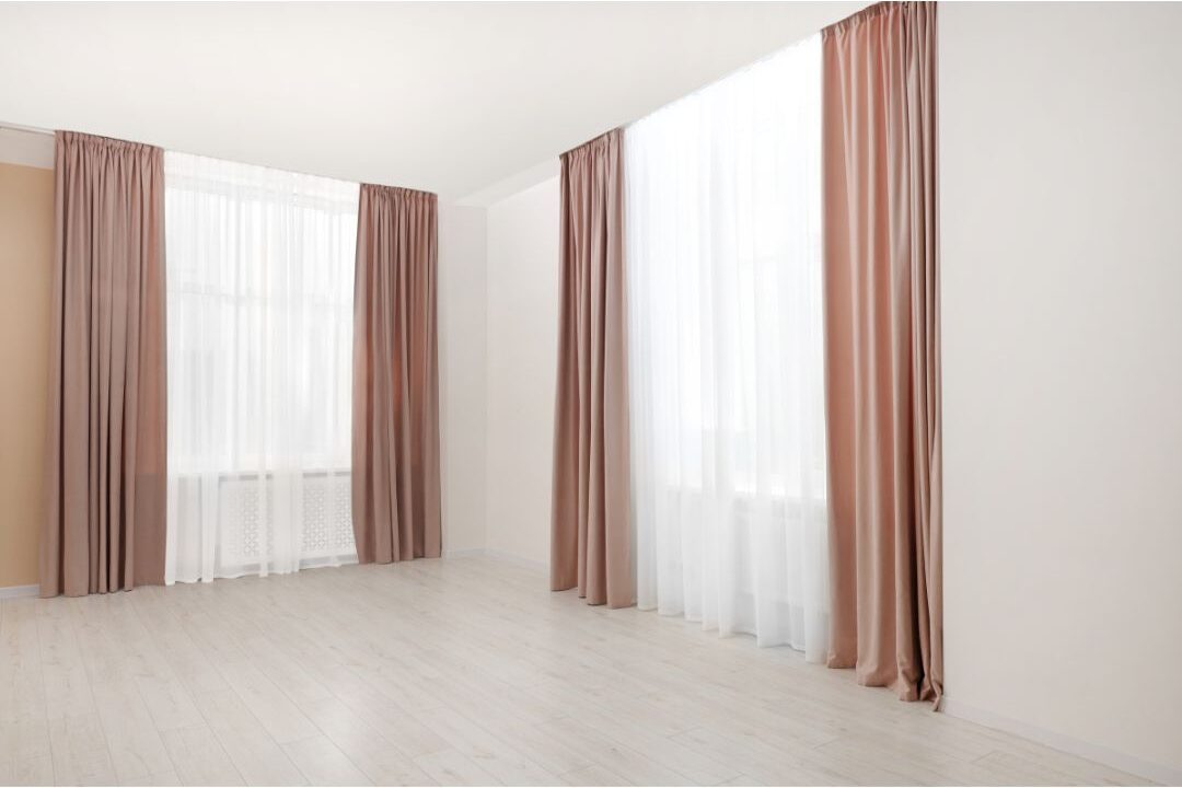 floor length curtains adding a luxurious elegant quality to a home room