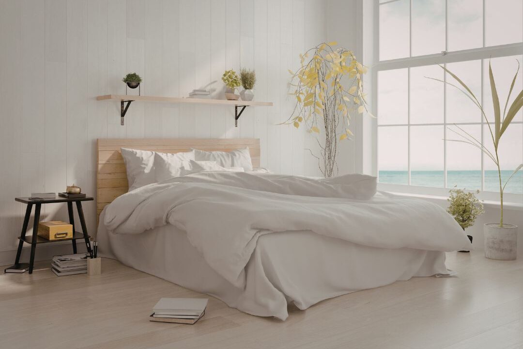 serene bedroom with clean white bedding showing foundational home peace systems