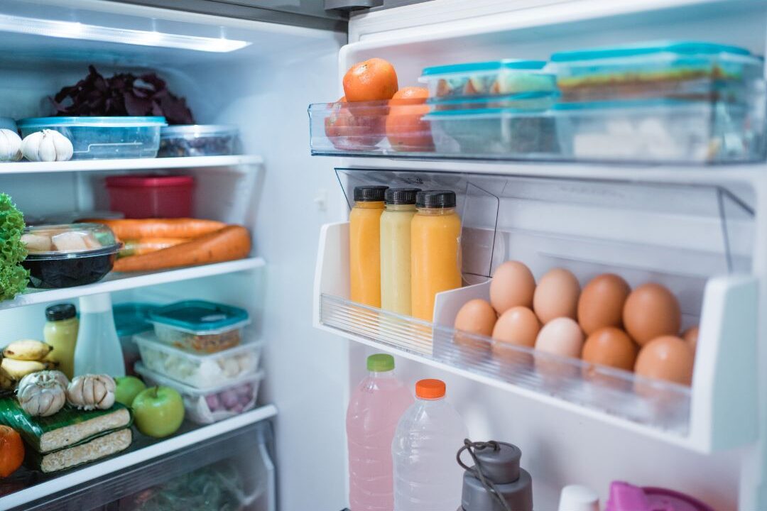 cleaning the fridge to fix why the home always smells bad