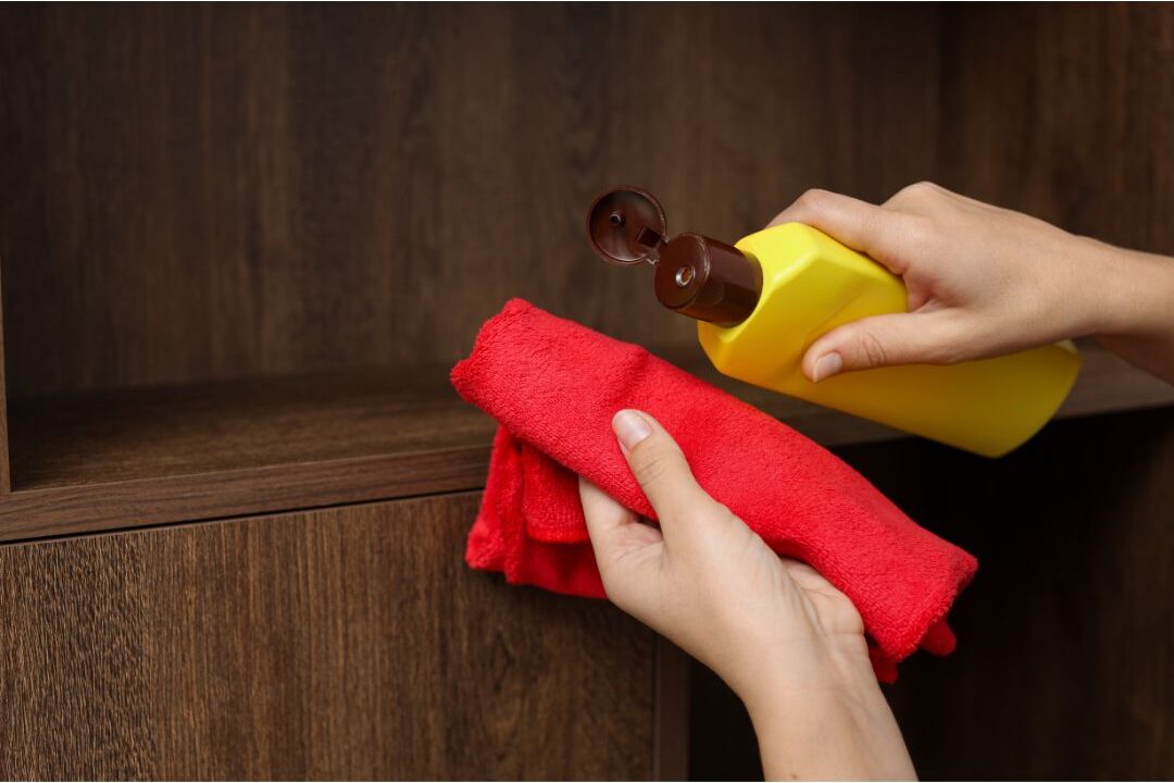 overusing furniture polish as a cleaning mistake that makes wooden surfaces dirtier over time
