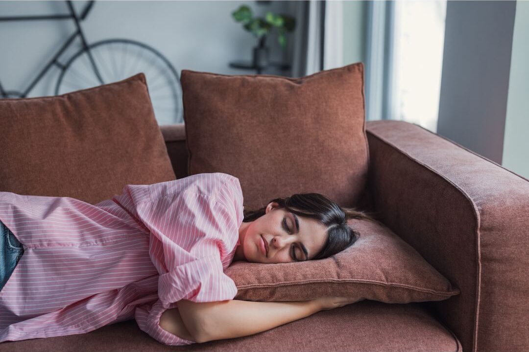 woman napping as a free rest self care habit without guilt