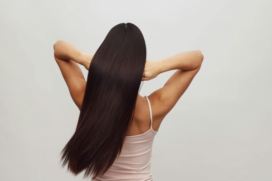 woman with neat simple hair as part of an elegant grooming routine