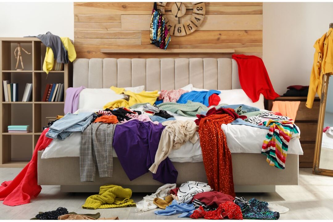 an overflowing wardrobe making a bedroom feel messy even after cleaning