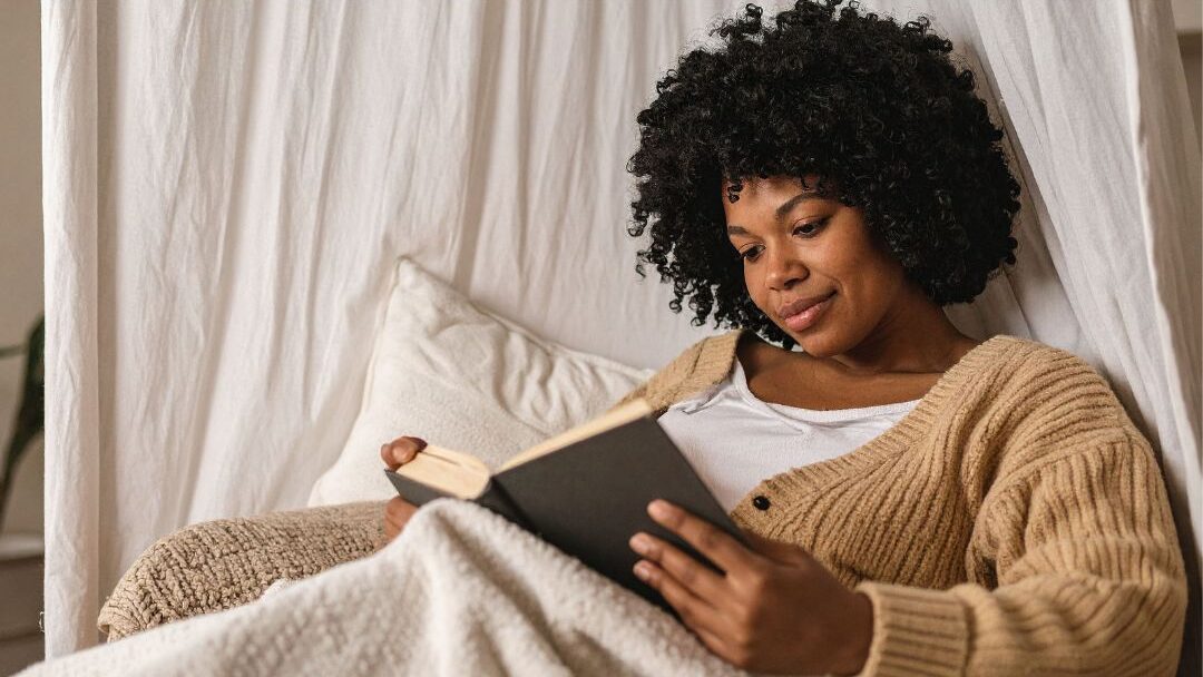 woman sitting in her personal space at home as a free self care habit