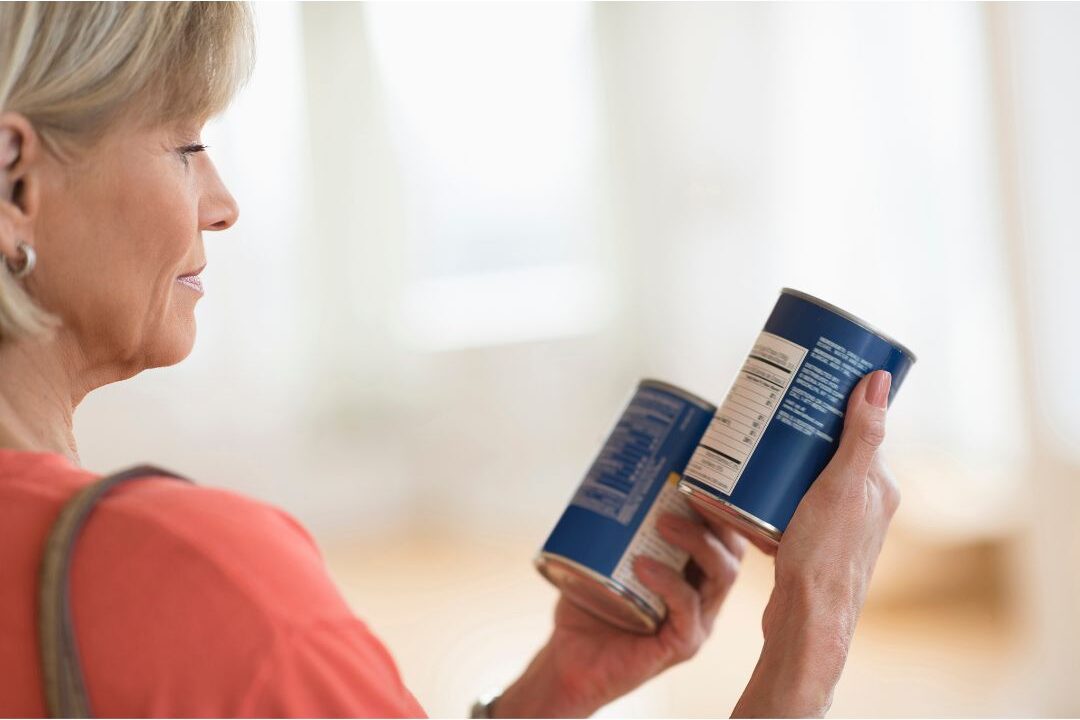 woman evaluating quality versus price to stop buying things that keep her broke