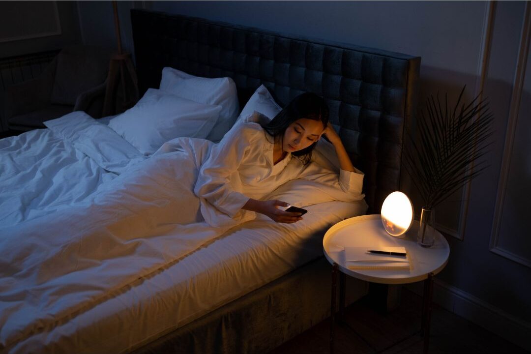 woman setting screen time boundaries as a free evening self care habit