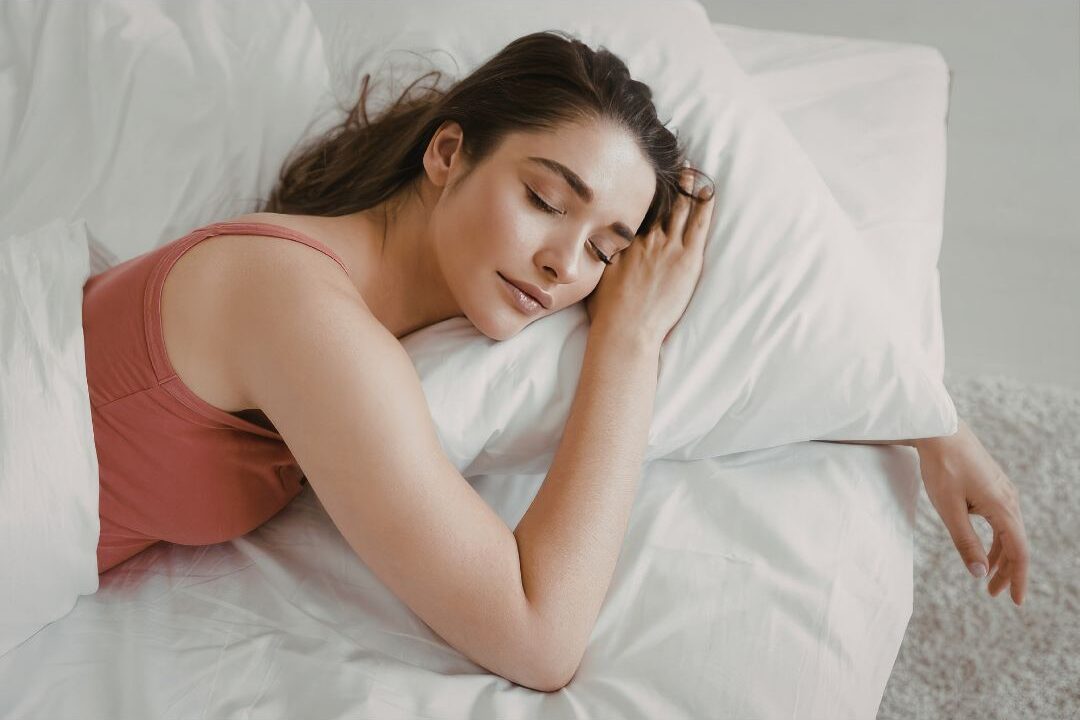 exhausted mom practicing self compassion and taking a deep breath