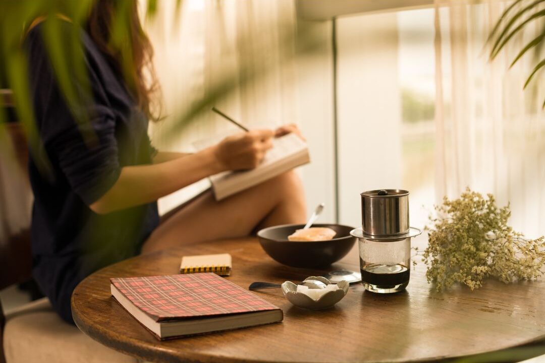 a woman turning off her smartphone to unplug from online expectations and reclaim peace at home