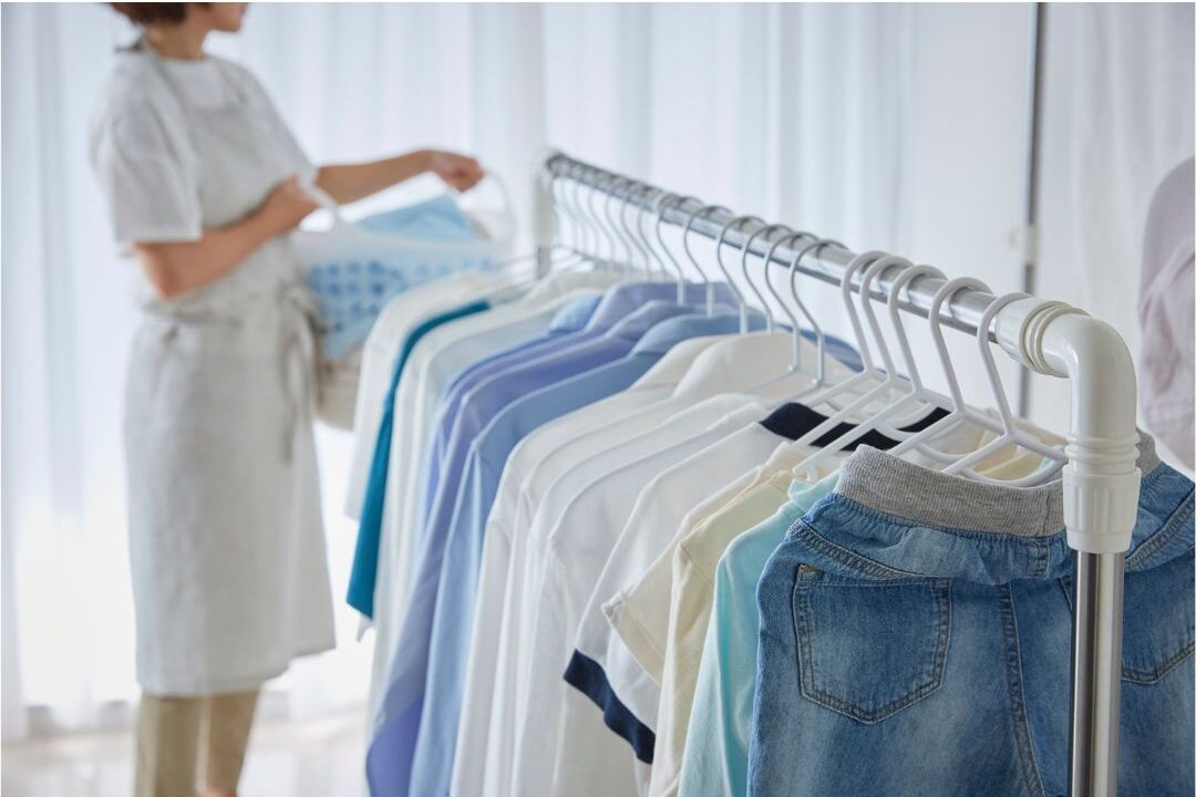 woman maintaining her wardrobe as a free way to look more elegant