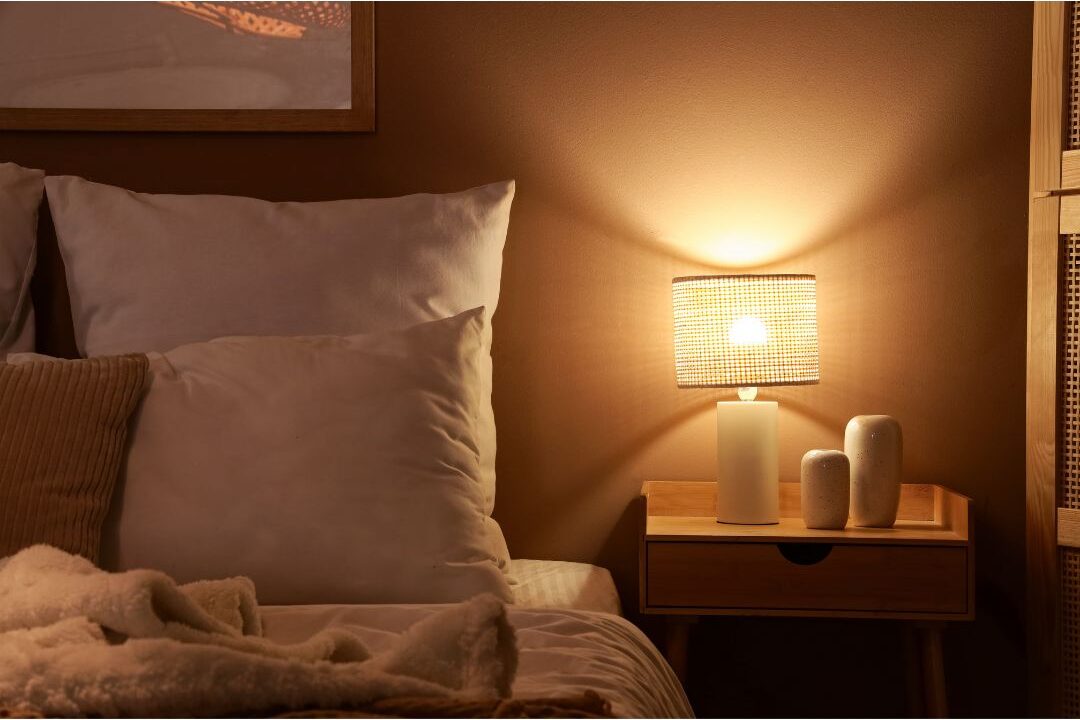 cozy bedroom lit warmly by lamps creating a peaceful evening sanctuary atmosphere