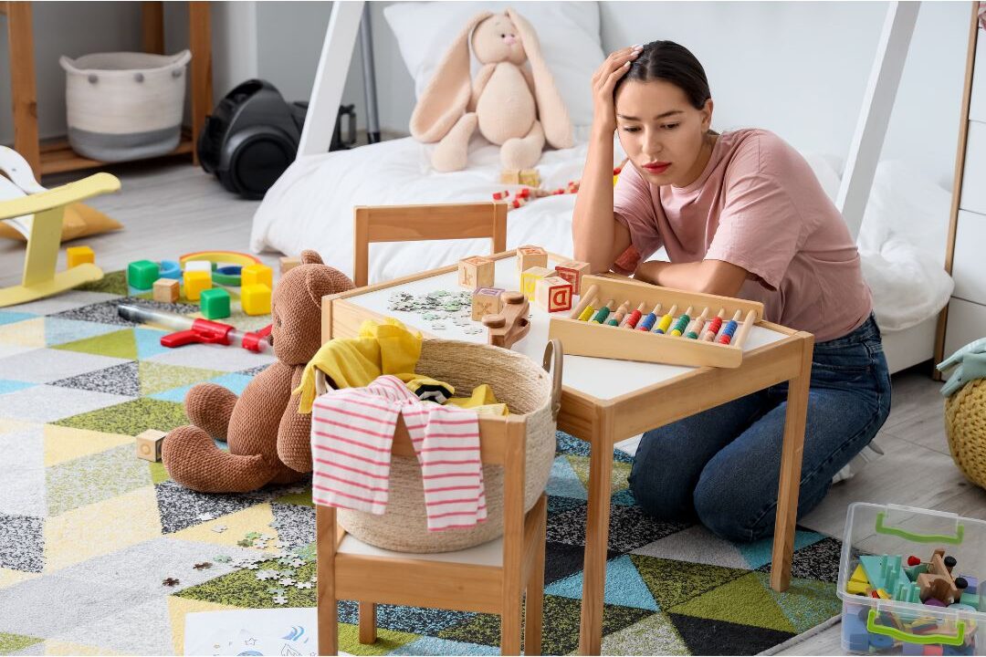 stressed woman looking at household chaos explaining why your home never feels peaceful