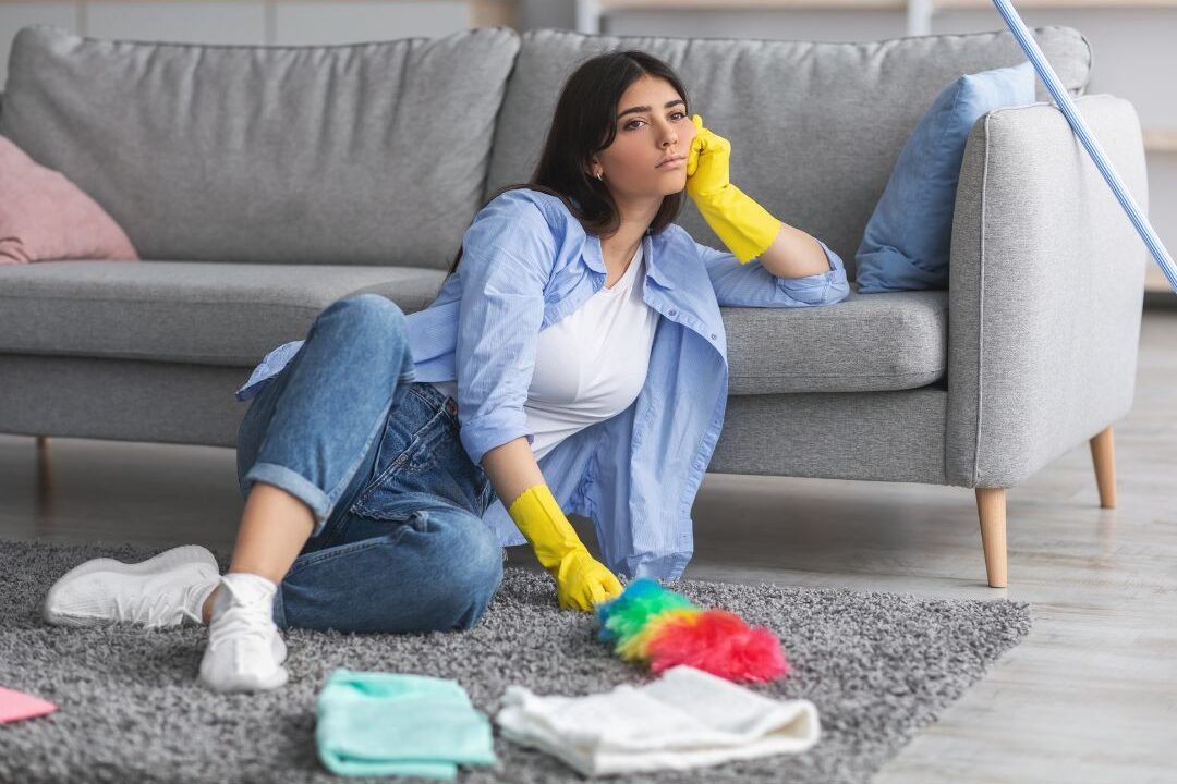 woman frustrated because her house always feels messy even after cleaning