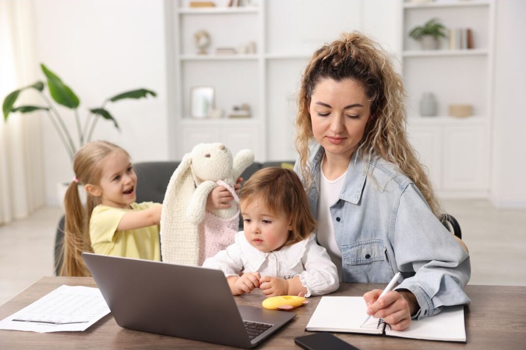 mom with young children working from a small home office that fits her season of life