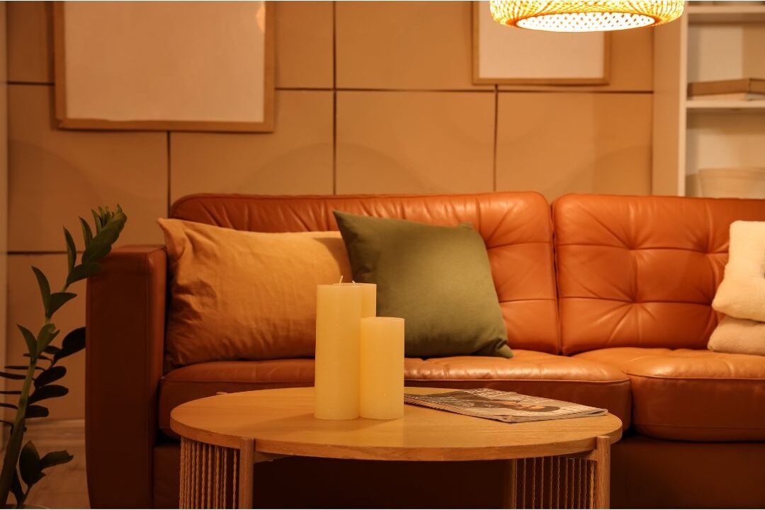 warm evening living room lit by soft table lamps and candles proving that elegant living doesn't mean expensive