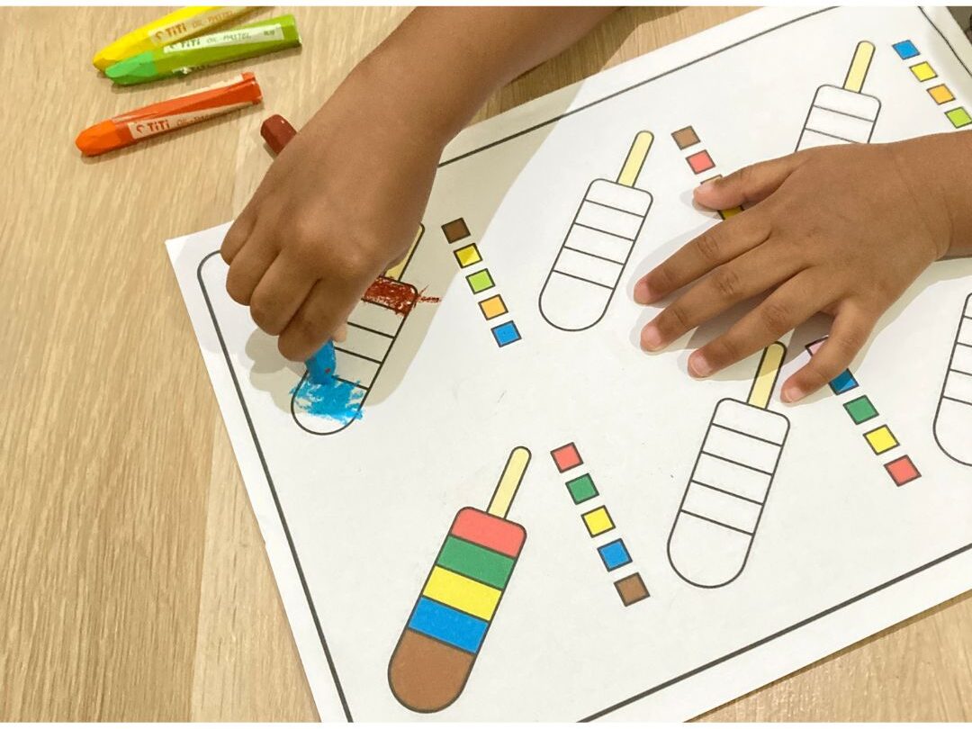 colorful educational activity worksheets printed on a table showcasing educational printables