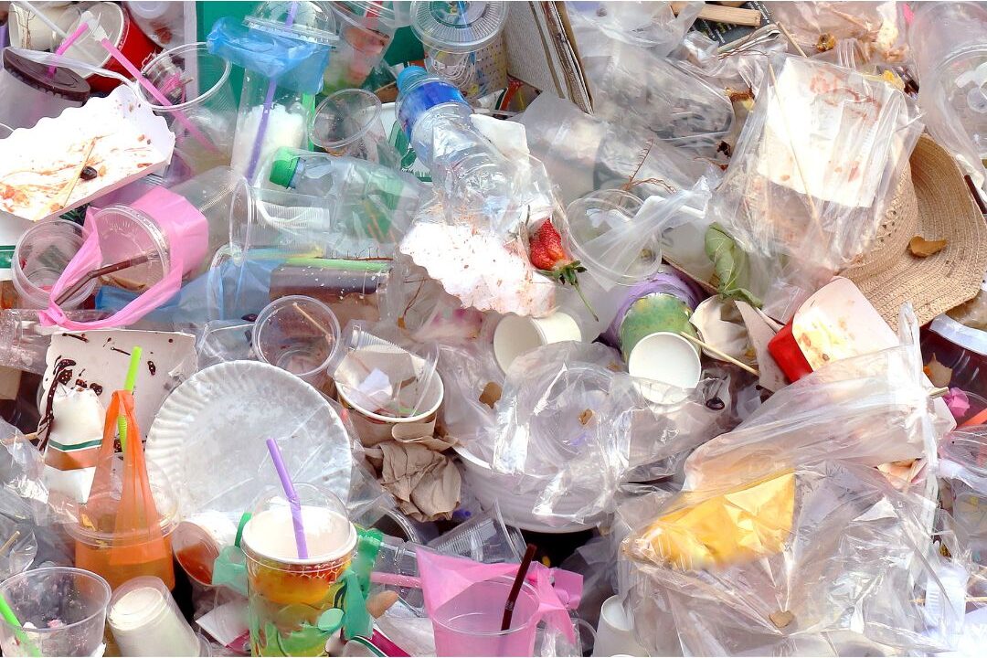 piles of cheap plastic household goods highlighting things poor families buy that wealthy families skip
