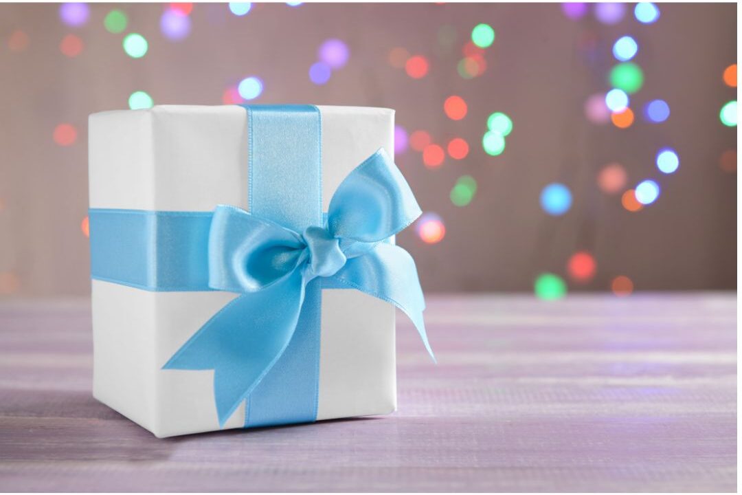 wrapped gift box with a simple ribbon on a table