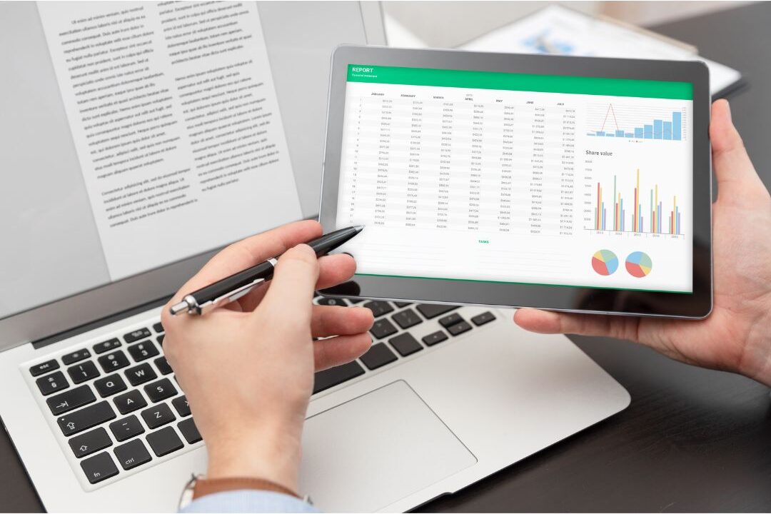 clean spreadsheet budget dashboard on a tablet displaying personal finance tracking
