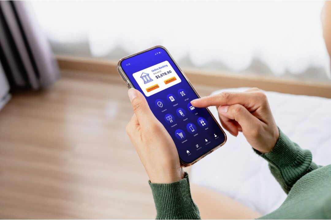 woman checking mobile banking receipts on her phone