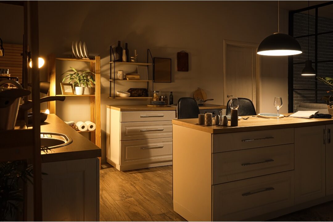cozy clean kitchen at night with soft warm lamp lighting implementing the systems that saved me 10 hours every week