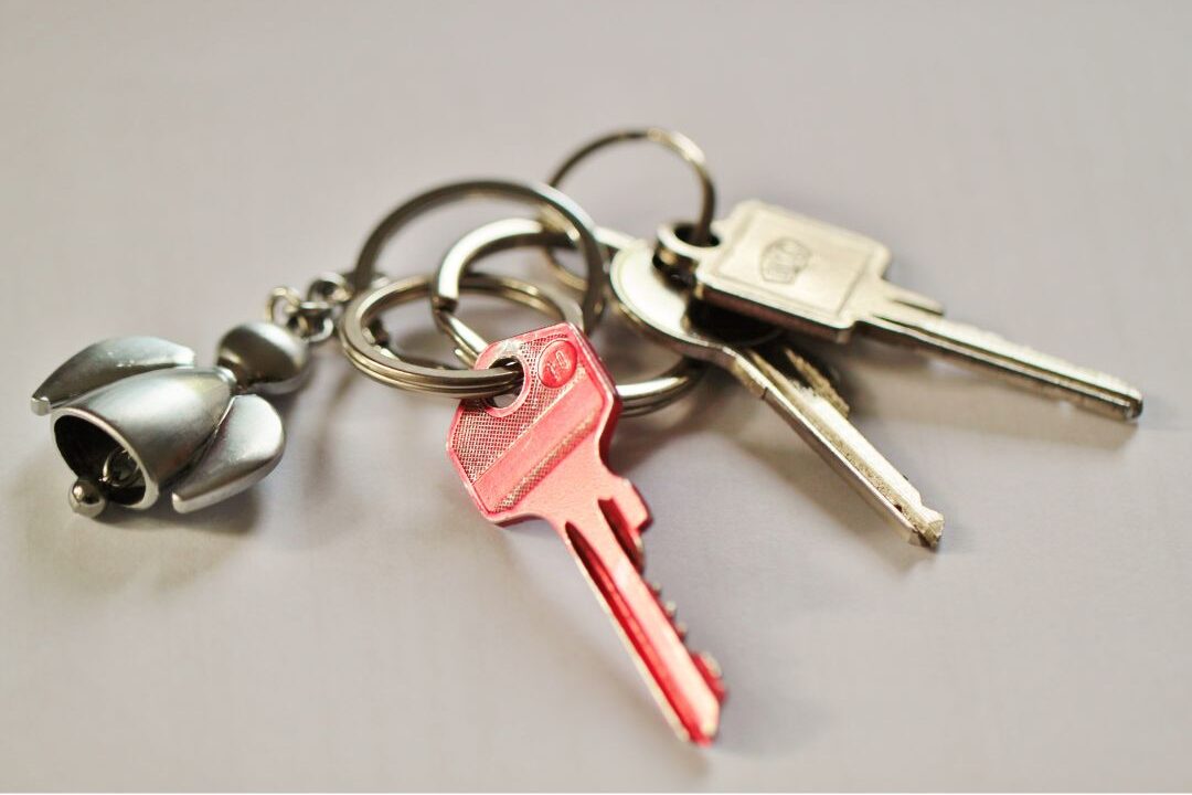 dropping keys near doorway illustrating physical clumsiness showing signs your body needs rest