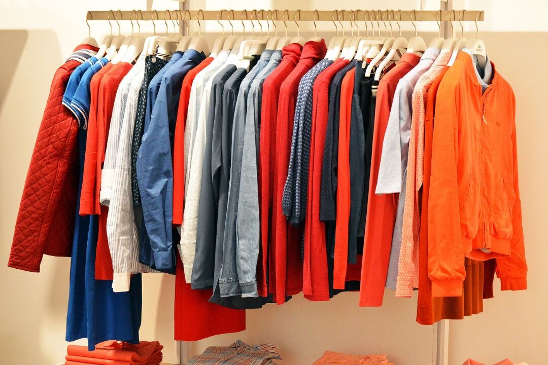 clothes hanging neatly on rail during a closet audit illustrating wardrobe decluttering