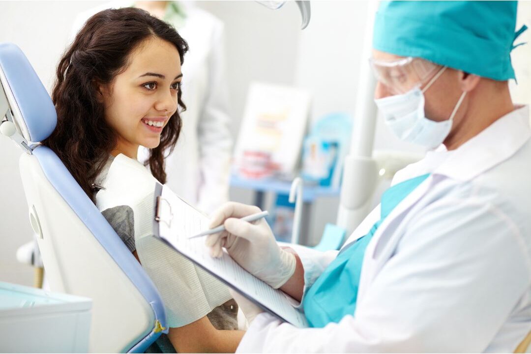 woman smiling during a preventive medical consultation