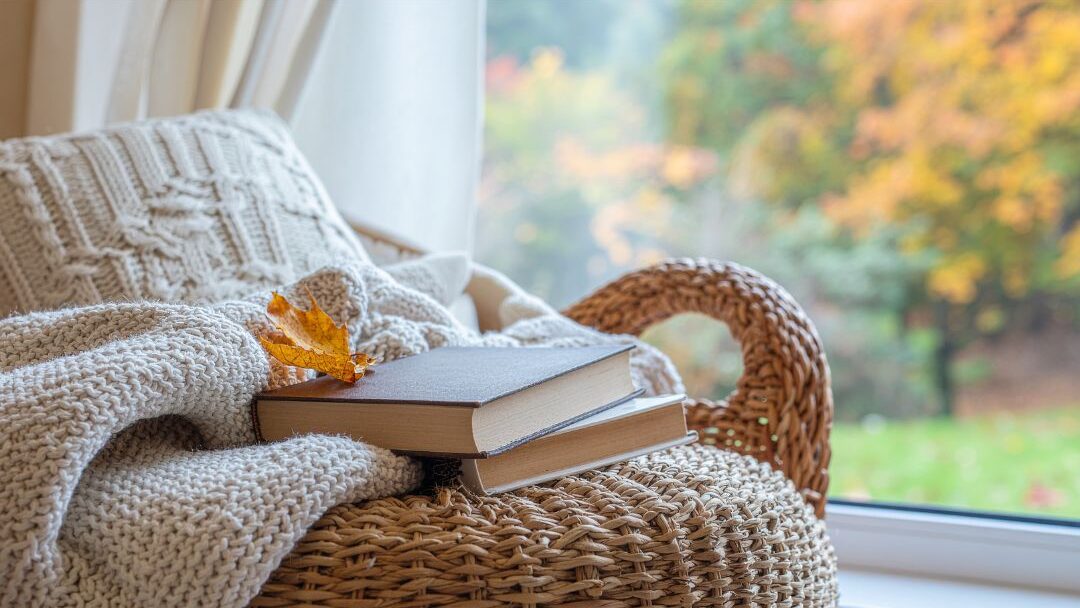 warm sunlit reading nook with comfortable armchair and soft blanket providing rest space
