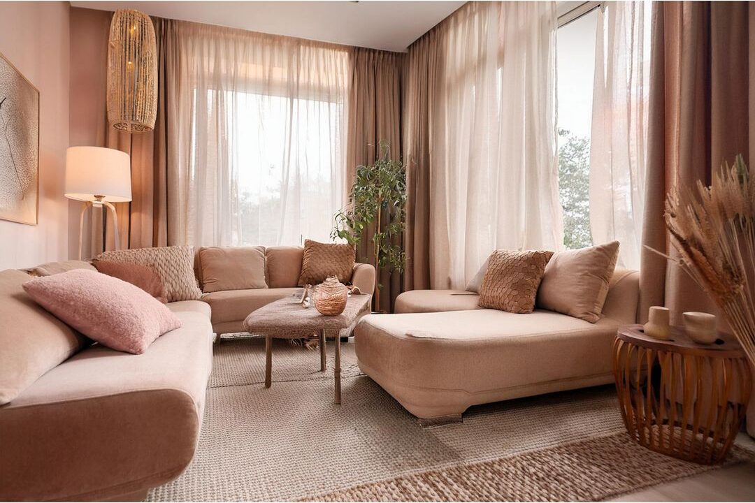 peaceful sunlit room with soft beige linen curtains and minimal decor showing interior restraint