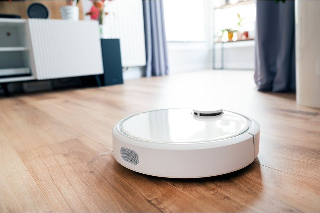 robot vacuum cleaner cleaning hardwood living room floor managing daily dust