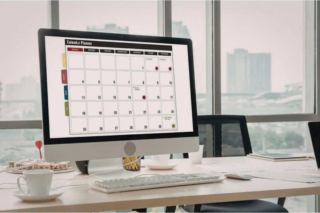 close up of laptop screen displaying clean professional team calendar schedule setting clear work hours