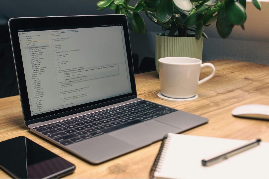 cozy home office desk with notebook coffee and laptop setup for peaceful digital business