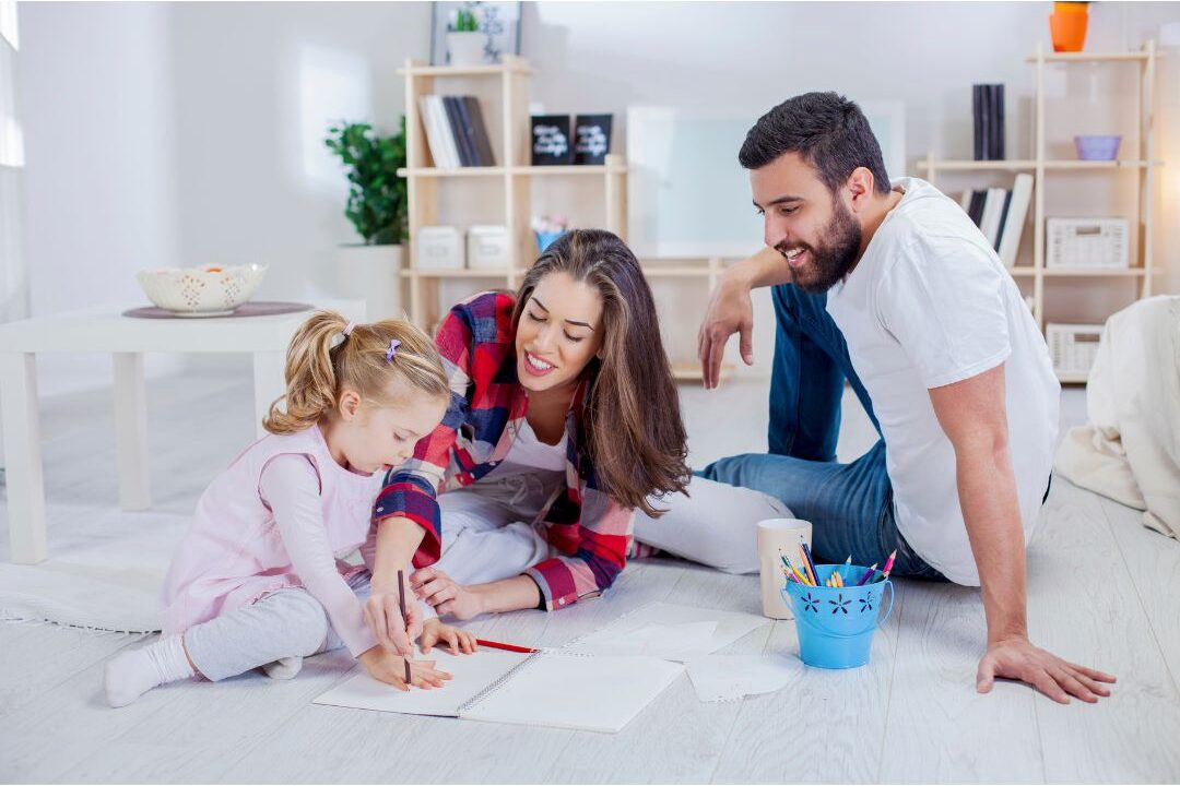 family playing safely in a living room representing domestic security
