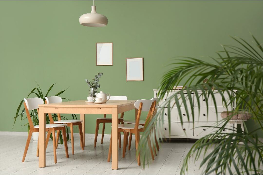 serene sunny dining room with minimalist wood table and green houseplant showing intentional home environment