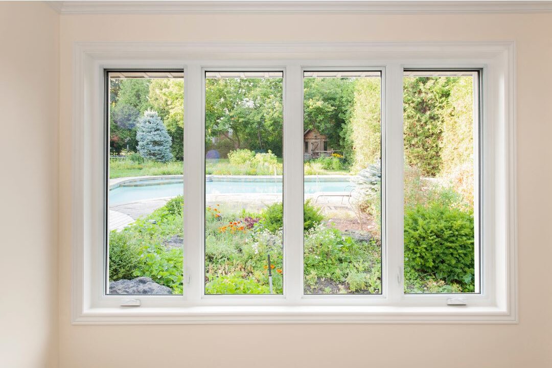 clean clear glass window looking out onto green backyard garden