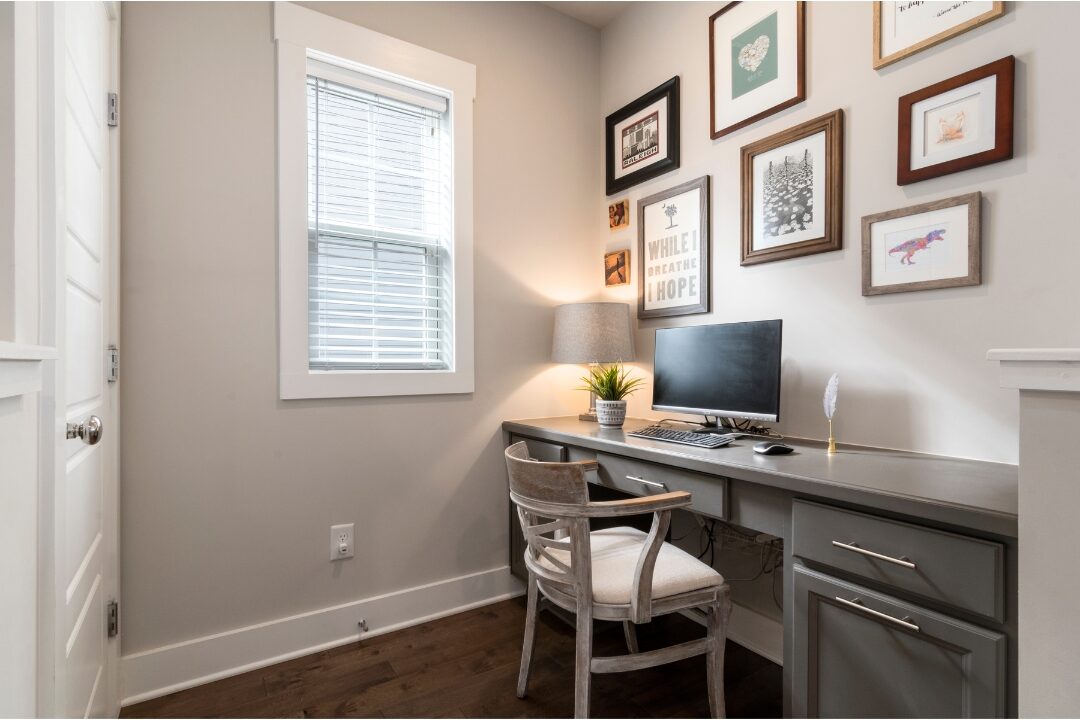 cozy home office corner with wooden desk plant and desk lamp establishing clear work boundaries