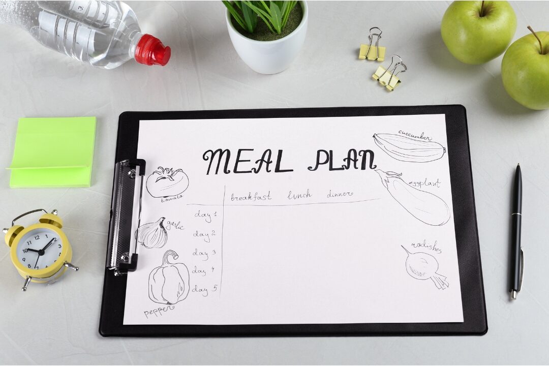 framed menu board with handwritten weekly dinner ideas organizing family meal plan