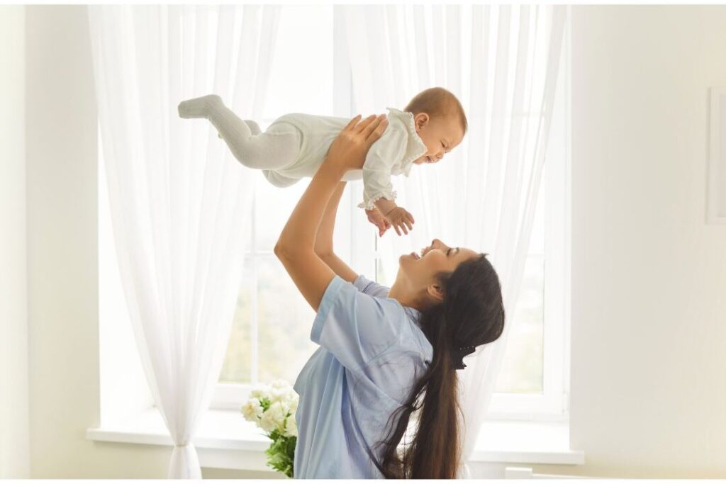 mother holding child warmly illustrating ease and financial freedom in soft life motherhood