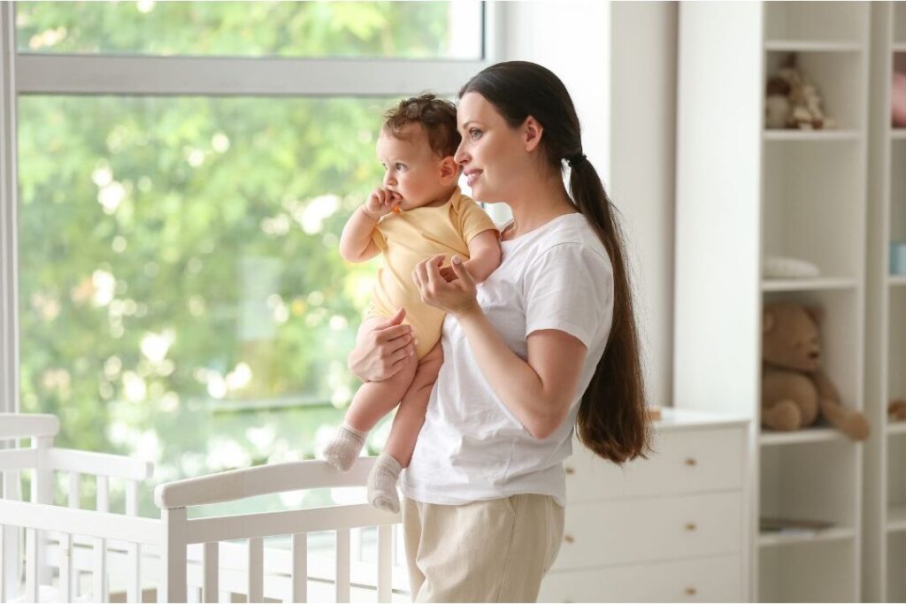 mother holding toddler warmly reflecting long term financial harmony and soft life
