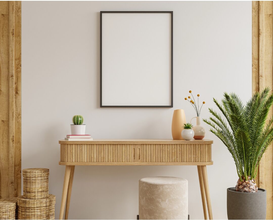 clean entryway console table with a ceramic lamp key bowl identifying 75 things every elegant home has