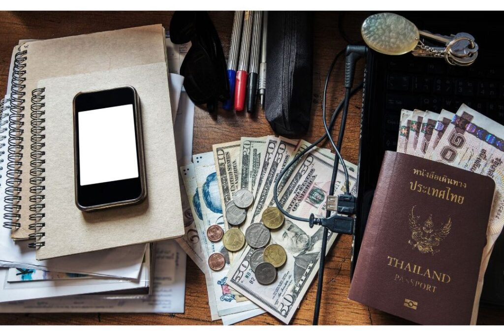 open entryway shelf messy with keys loose coins and sunglasses