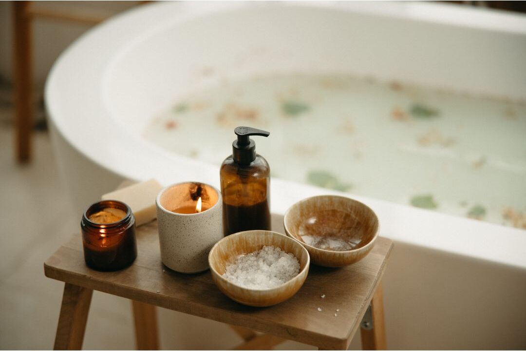 soaking bathtub with warm water and bath salts demonstrating 60 soft life ideas every mom should try