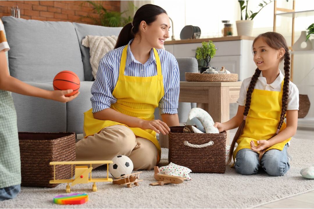 parent and child putting away toys into wicker baskets before bed exploring I stopped doing these 12 things my home has never been cleaner