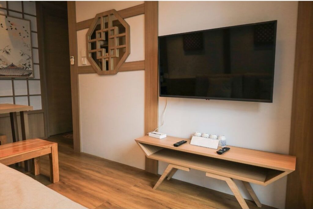 wall mounted television with hidden cables showing how these 10 things quietly make your house feel chaotic