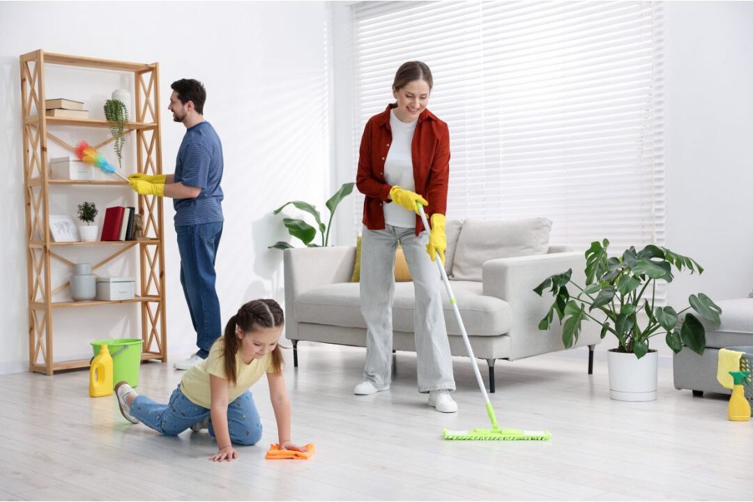 family working together tidying up bright dining room area discovering I stopped doing these 12 things my home has never been cleaner